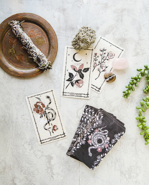 botanical tarot card deck with crystals & sage on brass tray